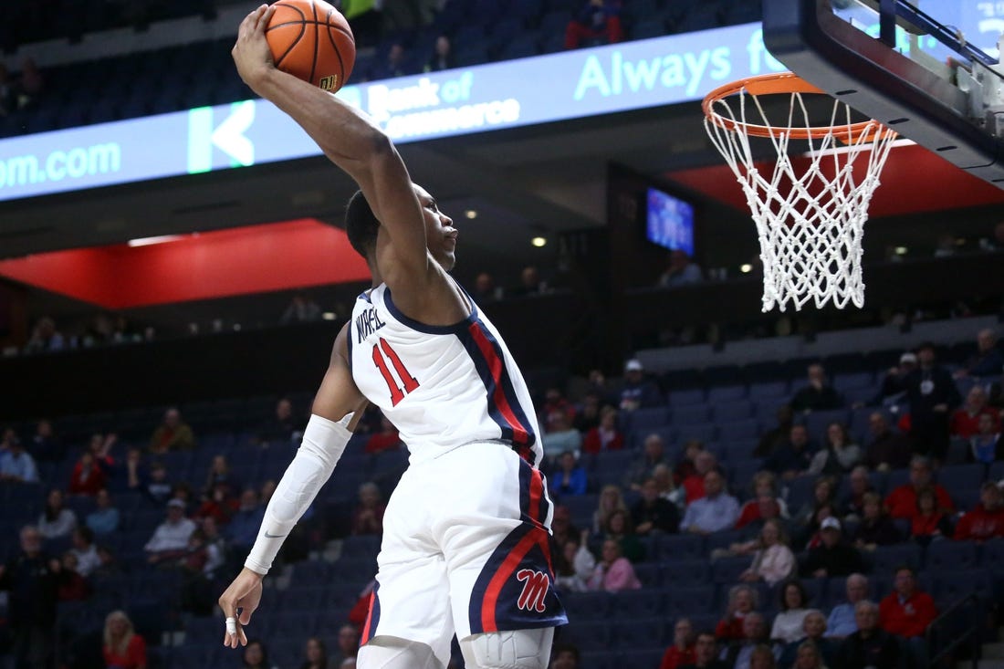 Dec 5, 2023; Oxford, Mississippi, USA; Mississippi Rebels guard Matthew Murrell (11) dunks during the second half against the Mount St. Mary's Mountaineers at The Sandy and John Black Pavilion at Ole Miss. Mandatory Credit: Petre Thomas-USA TODAY Sports