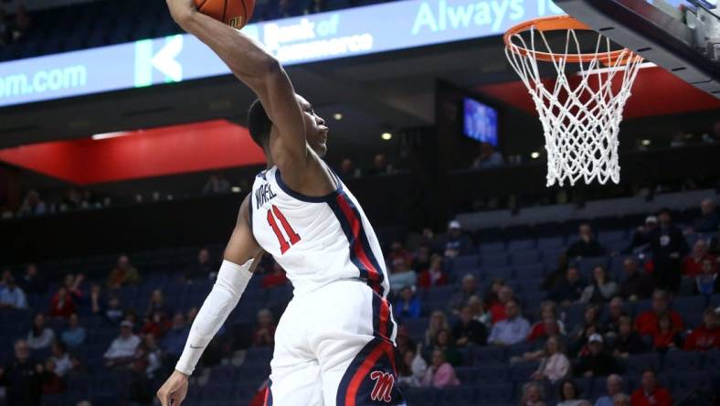 Dec 5, 2023; Oxford, Mississippi, USA; Mississippi Rebels guard Matthew Murrell (11) dunks during the second half against the Mount St. Mary's Mountaineers at The Sandy and John Black Pavilion at Ole Miss. Mandatory Credit: Petre Thomas-USA TODAY Sports