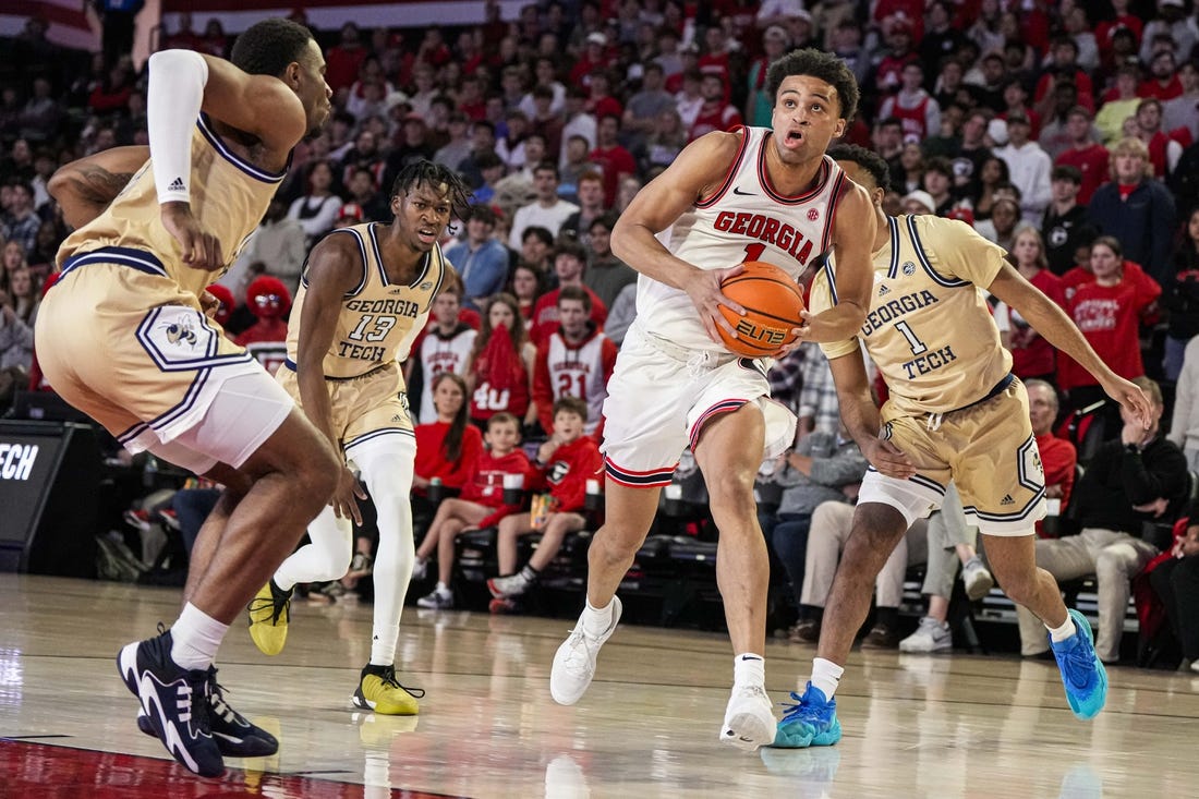 Dec 5, 2023; Athens, Georgia, USA; Georgia Bulldogs guard Jabri Abdur-Rahim (1) drives the ball to the basket against the Georgia Tech Yellow Jackets at Stegeman Coliseum. Mandatory Credit: Dale Zanine-USA TODAY Sports