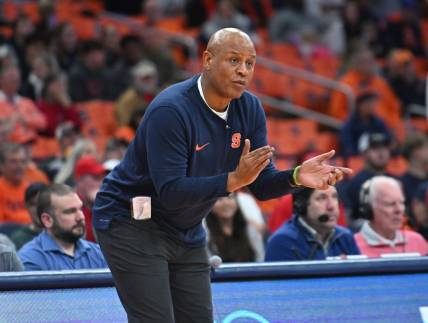 Dec 5, 2023; Syracuse, New York, USA; Syracuse Orange head coach Adrian Autry encourages his players on the court against the Cornell Big Red in the second half at the JMA Wireless Dome. Mandatory Credit: Mark Konezny-USA TODAY Sports