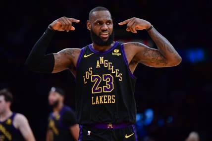 Dec 5, 2023; Los Angeles, California, USA; Los Angeles Lakers forward LeBron James (23) celebrates his basket scored against the Phoenix Suns during the second half of the In Season Tournament quarterfinal at Crypto.com Arena. Mandatory Credit: Gary A. Vasquez-USA TODAY Sports