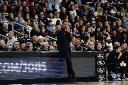 Dec 2, 2023; Providence, Rhode Island, USA; Providence Friars head coach Kim English looks on during the second half against the Rhode Island Rams at Amica Mutual Pavilion. Mandatory Credit: Eric Canha-USA TODAY Sports