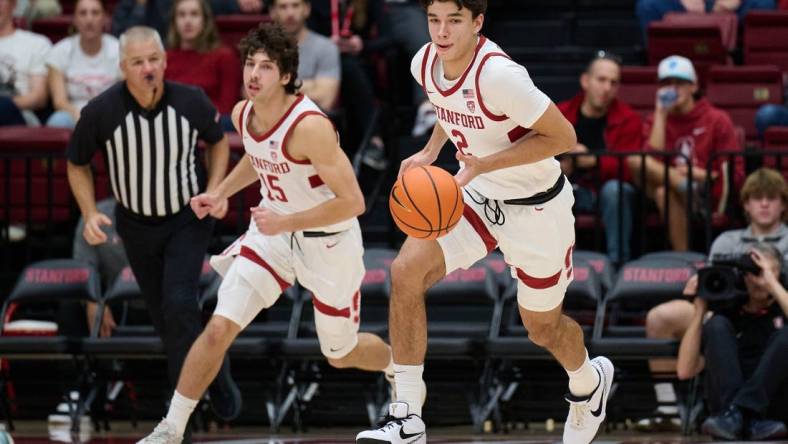 Dec 3, 2023; Stanford, California, USA; Stanford Cardinal guard Andrej Stojakovic (2) brings the ball up court with guard Benny Gealer (15) against the San Diego Toreros during the first half at Maples Pavilion. Mandatory Credit: Robert Edwards-USA TODAY Sports