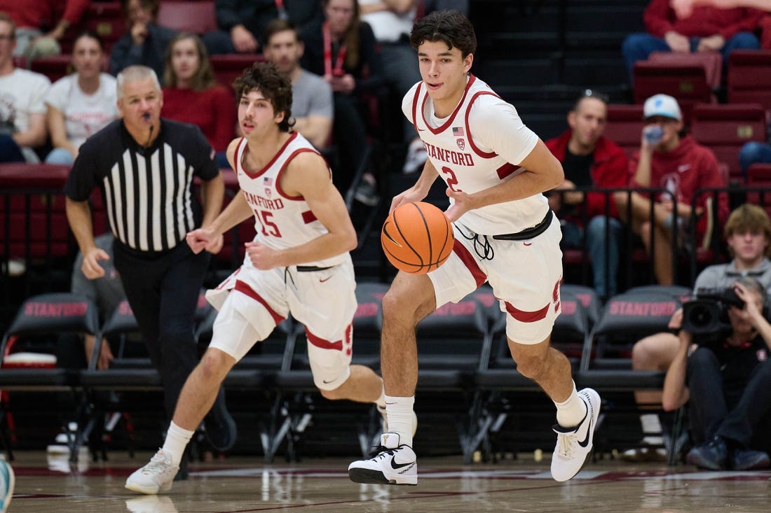 Dec 3, 2023; Stanford, California, USA; Stanford Cardinal guard Andrej Stojakovic (2) brings the ball up court with guard Benny Gealer (15) against the San Diego Toreros during the first half at Maples Pavilion. Mandatory Credit: Robert Edwards-USA TODAY Sports