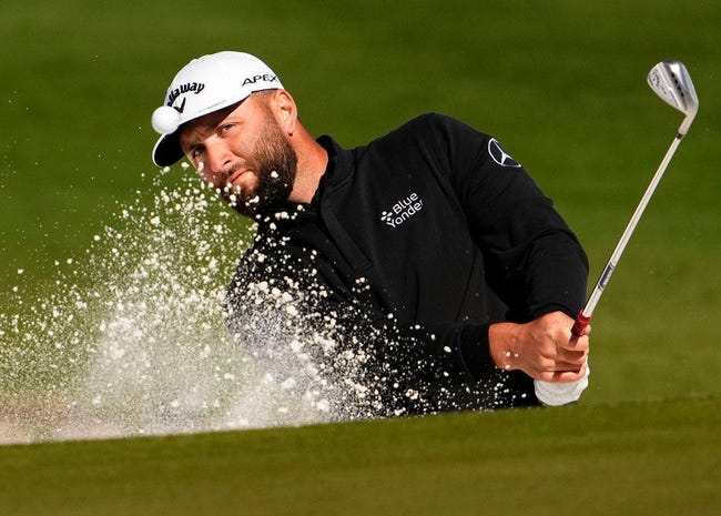 Jon Rahm makes an eagle-3 from a green side bunker on the 15th hole during round two of the WM Phoenix Open at TPC Scottsdale on Feb 10, 2023.