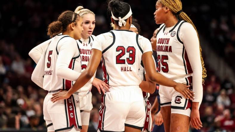 Dec 6, 2023; Columbia, South Carolina, USA; South Carolina Gamecocks players huddle against the Morgan State Lady Bears in the first half at Colonial Life Arena. Mandatory Credit: Jeff Blake-USA TODAY Sports