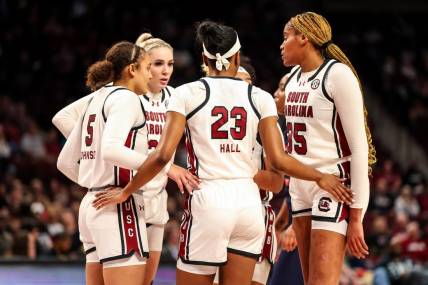 Dec 6, 2023; Columbia, South Carolina, USA; South Carolina Gamecocks players huddle against the Morgan State Lady Bears in the first half at Colonial Life Arena. Mandatory Credit: Jeff Blake-USA TODAY Sports