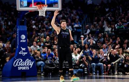 Dec 6, 2023; Dallas, Texas, USA;  Dallas Mavericks guard Luka Doncic (77) reacts during the second quarter against the Utah Jazz at American Airlines Center. Mandatory Credit: Kevin Jairaj-USA TODAY Sports