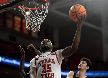Texas Tech's forward Devan Cambridge (35) goes for a layup against Omaha in a non-conference basketball game, Wednesday, Dec. 6, 2023, at United Supermarkets Arena.