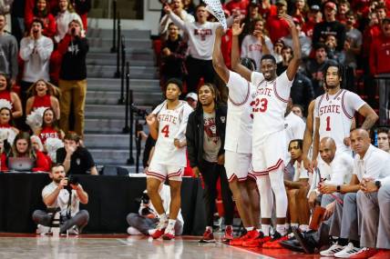 Dec 6, 2023; Raleigh, North Carolina, USA; North Carolina State Wolfpack bench reacts during the second half against Maryland-Eastern Shore Hawks at James T. Valvano Arena at William Neal Reynolds. Mandatory Credit: Jaylynn Nash-USA TODAY Sports