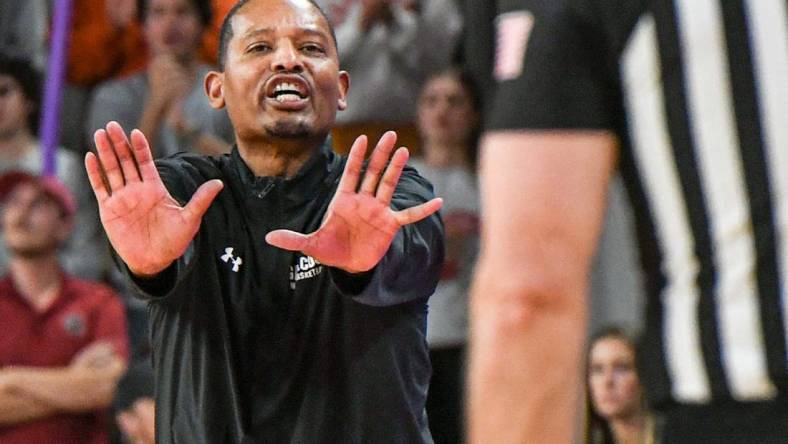 Dec 6, 2023; Clemson, South Carolina, USA; University of South Carolina Head Coach Lamont Paris talks to a referee in the game with Clemson during the second half at Littlejohn Coliseum. Mandatory Credit: Ken Ruinard-USA TODAY Sports