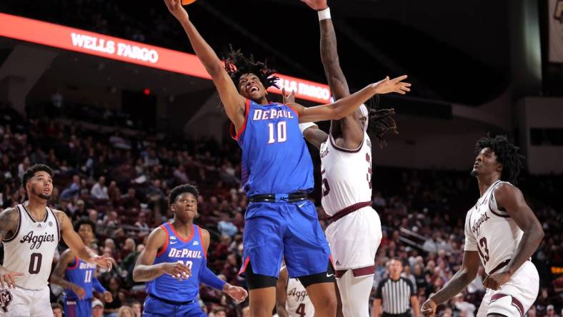 Dec 6, 2023; College Station, Texas, USA; DePaul Blue Demons guard Jaden Henley (10) attempts a layup against the Texas A&M Aggies during the second half at Reed Arena. Mandatory Credit: Erik Williams-USA TODAY Sports