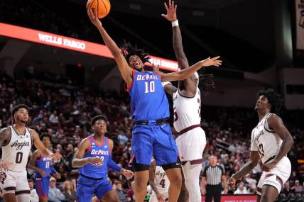 Dec 6, 2023; College Station, Texas, USA; DePaul Blue Demons guard Jaden Henley (10) attempts a layup against the Texas A&M Aggies during the second half at Reed Arena. Mandatory Credit: Erik Williams-USA TODAY Sports