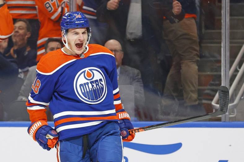 Dec 6, 2023; Edmonton, Alberta, CAN; Edmonton Oilers forward Zach Hyman (18) celebrates after scoring a goal, his second of the game against the Carolina Hurricanes during the first period at Rogers Place. Mandatory Credit: Perry Nelson-USA TODAY Sports