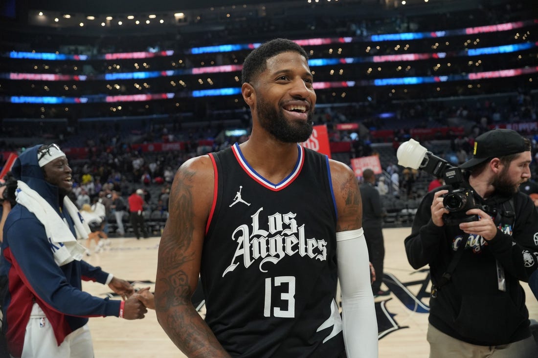 Dec 6, 2023; Los Angeles, California, USA; LA Clippers forward Paul George (13) reacts after the game against the Denver Nuggets at Crypto.com Arena. Mandatory Credit: Kirby Lee-USA TODAY Sports