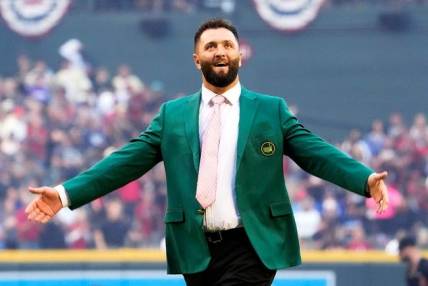 Masters champion Jon Rahm throws out the first pitch during Game 4 in the World Series at Chase Field on Oct 31, 2023.