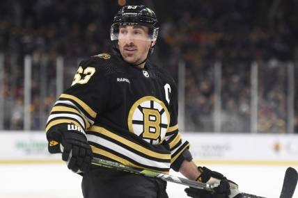 Dec 7, 2023; Boston, Massachusetts, USA; Boston Bruins left wing Brad Marchand (63) looks over at the linesman after an offside call during the first period against the Buffalo Sabres at TD Garden. Mandatory Credit: Bob DeChiara-USA TODAY Sports
