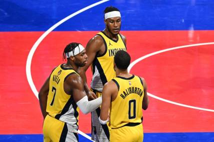 Dec 7, 2023; Las Vegas, Nevada, USA; Indiana Pacers guard Buddy Hield (7), center Myles Turner (33) and guard Tyrese Haliburton (0) celebrate after a victory against the Milwaukee Bucks at T-Mobile Arena. Mandatory Credit: Candice Ward-USA TODAY Sports