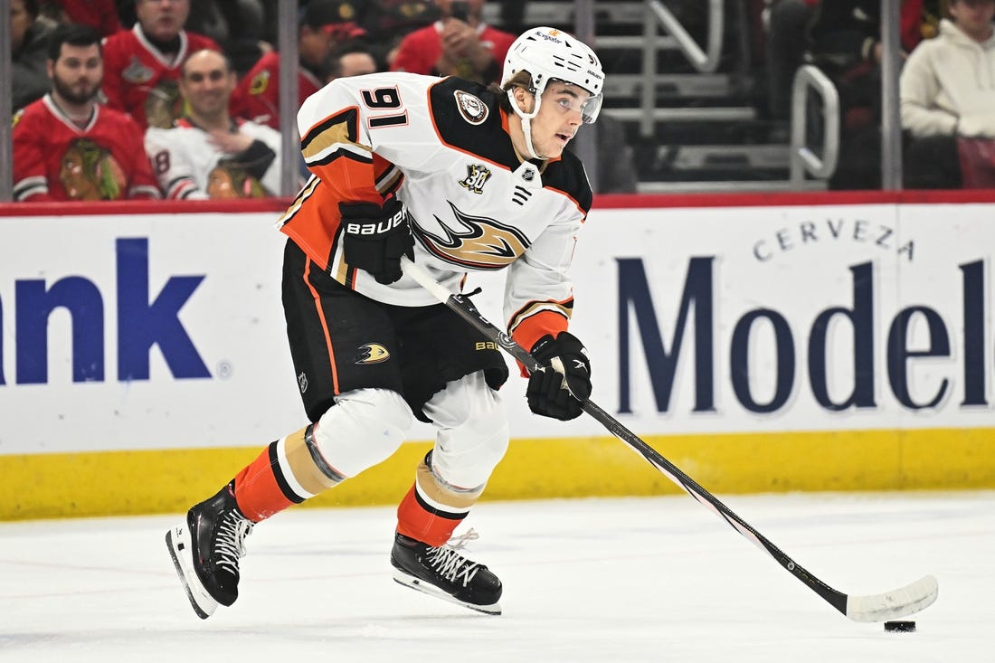 Dec 7, 2023; Chicago, Illinois, USA; Anaheim Ducks forward Leo Carlsson (91) controls the puck in the first period against the Chicago Blackhawks at United Center. Mandatory Credit: Jamie Sabau-USA TODAY Sports