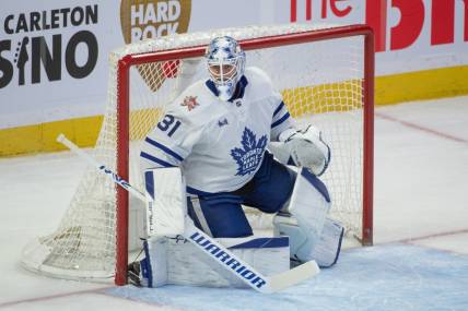 Dec 7, 2023; Ottawa, Ontario, CAN; Toronto Maple Leafs goalie Martin Jones (31) is called into action following an injury with Joseph Woll (60) in the third period against the Ottawa Senators at the Canadian Tire Centre. Mandatory Credit: Marc DesRosiers-USA TODAY Sports
