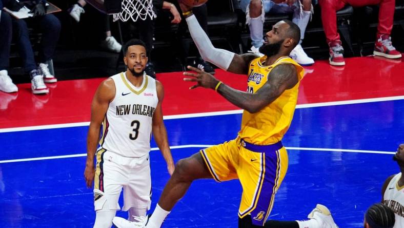 Dec 7, 2023; Las Vegas, Nevada, USA; Los Angeles Lakers forward LeBron James (23) shoots the ball against Los Angeles Lakers forward Anthony Davis (3) in the NBA In Season Tournament Semifinal at T-Mobile Arena. Mandatory Credit: Kyle Terada-USA TODAY Sports