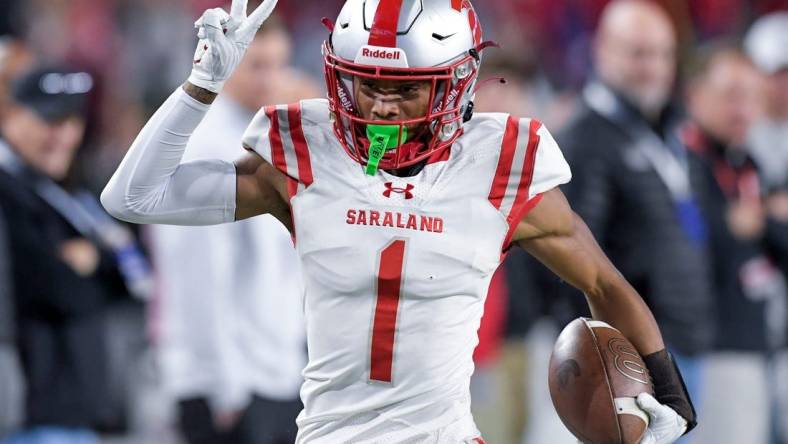 Saraland's Ryan Williams (1) scores his second touchdown of the night against Clay-Chalkville during the AHSAA Class 6A football state championship game at Bryant Denny Stadium in Tuscaloosa, Ala., on Friday December 8, 2023.