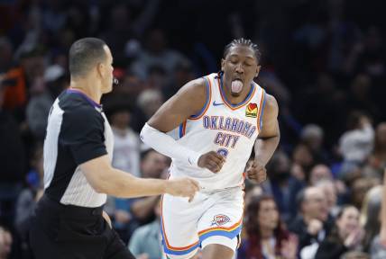 Dec 8, 2023; Oklahoma City, Oklahoma, USA; Oklahoma City Thunder forward Jalen Williams (8) reacts after scoring a basket against the Golden State Warriors during the second half at Paycom Center. Mandatory Credit: Alonzo Adams-USA TODAY Sports