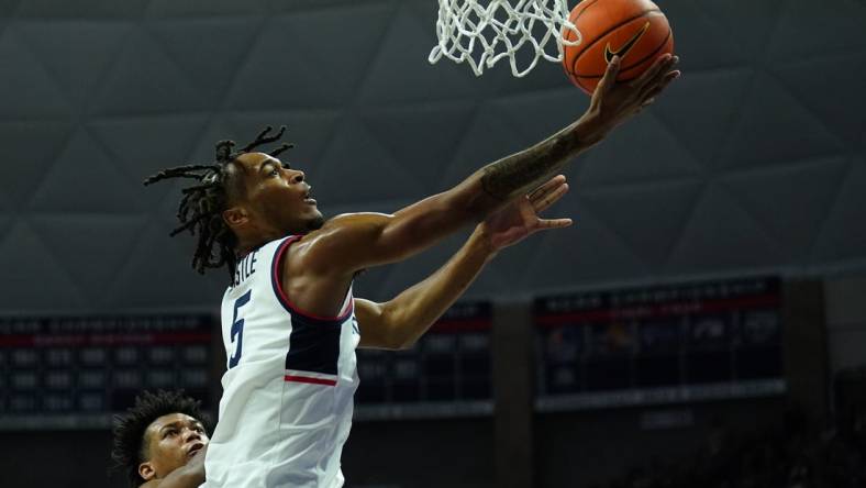 Dec 9, 2023; Storrs, Connecticut, USA; UConn Huskies guard Stephon Castle (5) drives to the basket against the Arkansas-Pine Bluff Golden Lions in the first half at Harry A. Gampel Pavilion. Mandatory Credit: David Butler II-USA TODAY Sports