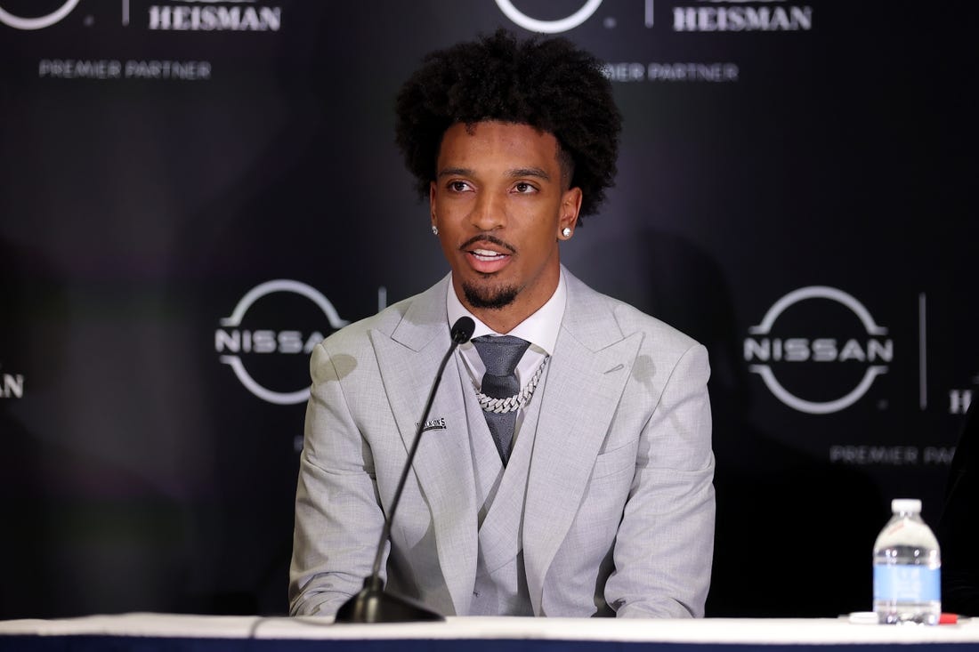 Dec 9, 2023; New York, New York, USA; LSU Tigers quarterback Jayden Daniels speaks to the media during a press conference in the Astor ballroom at the New York Marriott Marquis before the presentation of the Heisman trophy. Mandatory Credit: Brad Penner-USA TODAY Sports
