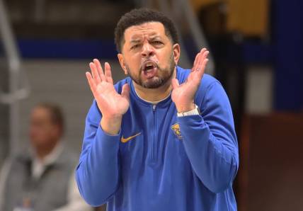 Dec 9, 2023; Pittsburgh, Pennsylvania, USA;  Pittsburgh Panthers head coach Jeff Capel reacts on the sidelines against the Canisius Golden Griffins during the second half at the Petersen Events Center. Pittsburgh won 82-71. Mandatory Credit: Charles LeClaire-USA TODAY Sports