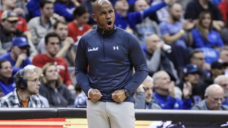 Dec 9, 2023; Newark, New Jersey, USA; Seton Hall Pirates head coach Shaheen Holloway reacts after the Rutgers Scarlet Knights call a timeout in the first half at Prudential Center. Mandatory Credit: Wendell Cruz-USA TODAY Sports