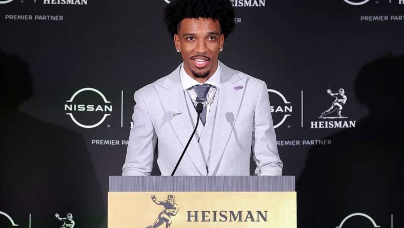 Dec 9, 2023; New York, New York, USA; LSU Tigers quarterback Jayden Daniels speaks to the media during a press conference in the Astor ballroom at the New York Marriott Marquis after winning the Heisman trophy. Mandatory Credit: Brad Penner-USA TODAY Sports