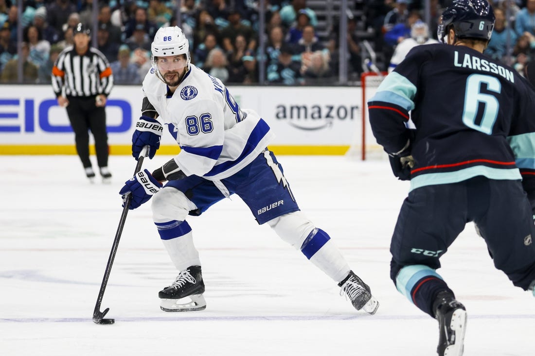 Dec 9, 2023; Seattle, Washington, USA; Tampa Bay Lightning right wing Nikita Kucherov (86) skates with the puck against the Seattle Kraken during the first period at Climate Pledge Arena. Mandatory Credit: Joe Nicholson-USA TODAY Sports