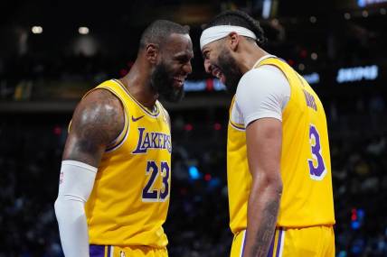 Dec 9, 2023; Las Vegas, Nevada, USA; Los Angeles Lakers forward LeBron James (23) and forward Anthony Davis (3) celebrate after winning the in season tournament championship final against the Indiana Pacers at T-Mobile Arena. Mandatory Credit: Kyle Terada-USA TODAY Sports