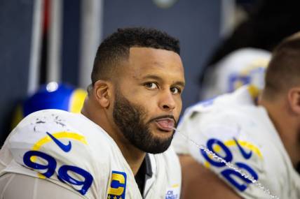 Nov 26, 2023; Glendale, Arizona, USA; Los Angeles Rams defensive tackle Aaron Donald (99) spits water out of his mouth against the Arizona Cardinals at State Farm Stadium. Mandatory Credit: Mark J. Rebilas-USA TODAY Sports