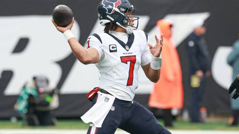 Dec 10, 2023; East Rutherford, New Jersey, USA; Houston Texans quarterback C.J. Stroud (7) throws the ball during the first half against the New York Jets at MetLife Stadium. Mandatory Credit: Vincent Carchietta-USA TODAY Sports