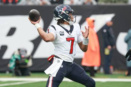 Dec 10, 2023; East Rutherford, New Jersey, USA; Houston Texans quarterback C.J. Stroud (7) throws the ball during the first half against the New York Jets at MetLife Stadium. Mandatory Credit: Vincent Carchietta-USA TODAY Sports