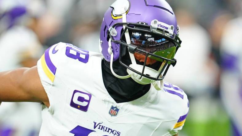 Dec 10, 2023; Paradise, Nevada, USA; Minnesota Vikings wide receiver Justin Jefferson (18) warms up before a game against the Las Vegas Raiders at Allegiant Stadium. Mandatory Credit: Stephen R. Sylvanie-USA TODAY Sports