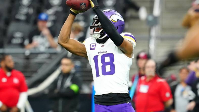 Dec 10, 2023; Paradise, Nevada, USA; Minnesota Vikings wide receiver Justin Jefferson (18) warms up before a game against the Las Vegas Raiders at Allegiant Stadium. Mandatory Credit: Stephen R. Sylvanie-USA TODAY Sports