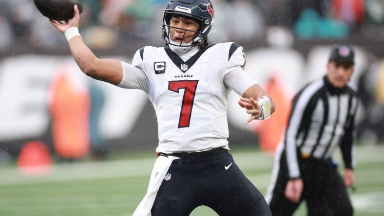 Dec 10, 2023; East Rutherford, New Jersey, USA; Houston Texans quarterback C.J. Stroud (7) throws a pass during the second half against the New York Jets at MetLife Stadium. Mandatory Credit: Vincent Carchietta-USA TODAY Sports