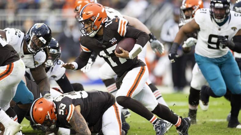 Dec 10, 2023; Cleveland, Ohio, USA; Cleveland Browns quarterback Dorian Thompson-Robinson (17) runs the ball against the Jacksonville Jaguars during the fourth quarter at Cleveland Browns Stadium. Mandatory Credit: Scott Galvin-USA TODAY Sports