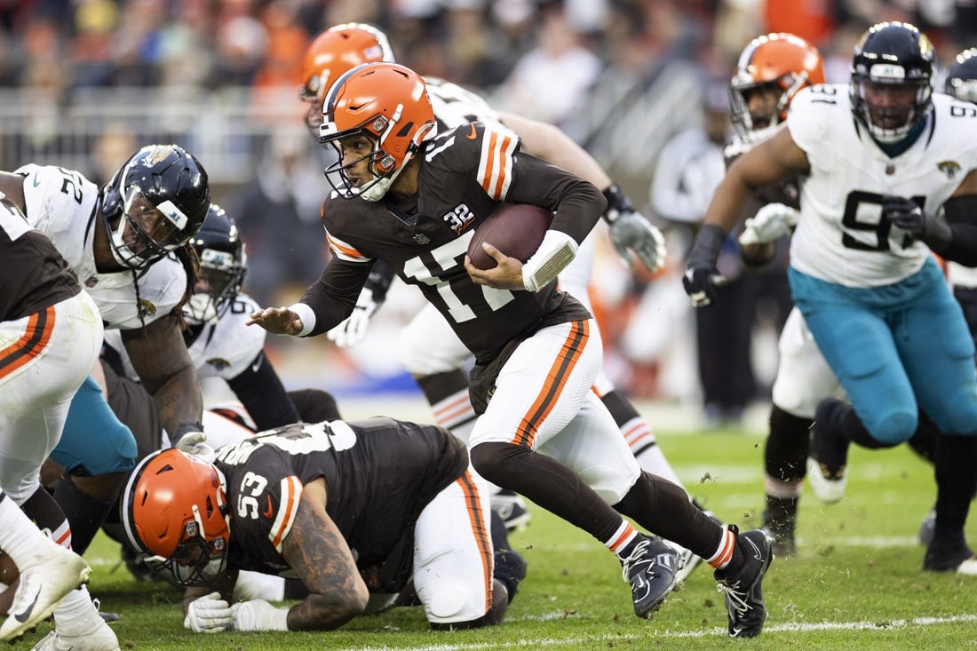 Dec 10, 2023; Cleveland, Ohio, USA; Cleveland Browns quarterback Dorian Thompson-Robinson (17) runs the ball against the Jacksonville Jaguars during the fourth quarter at Cleveland Browns Stadium. Mandatory Credit: Scott Galvin-USA TODAY Sports