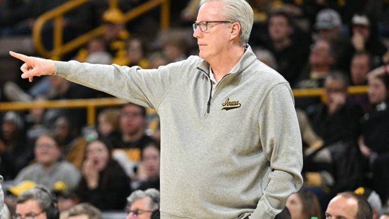 Dec 10, 2023; Iowa City, Iowa, USA; Iowa Hawkeyes head coach Fran McCaffery directs his team against the Michigan Wolverines during the first half at Carver-Hawkeye Arena. Mandatory Credit: Jeffrey Becker-USA TODAY Sports