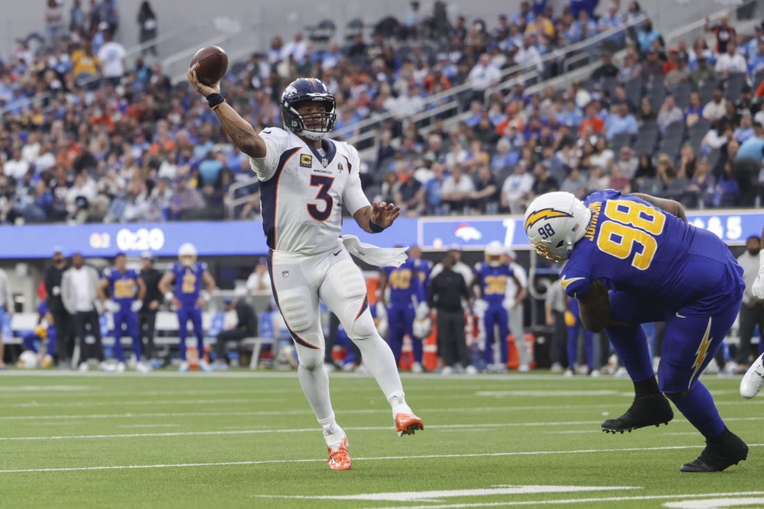 Dec 10, 2023; Inglewood, California, USA; Denver Broncos quarterback Russell Wilson (3) throws the ball during the first half in a game against the Los Angeles Chargers at SoFi Stadium. Mandatory Credit: Yannick Peterhans-USA TODAY Sports