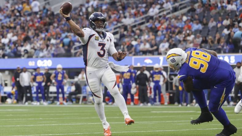 Dec 10, 2023; Inglewood, California, USA; Denver Broncos quarterback Russell Wilson (3) throws the ball during the first half in a game against the Los Angeles Chargers at SoFi Stadium. Mandatory Credit: Yannick Peterhans-USA TODAY Sports