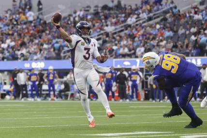 Dec 10, 2023; Inglewood, California, USA; Denver Broncos quarterback Russell Wilson (3) throws the ball during the first half in a game against the Los Angeles Chargers at SoFi Stadium. Mandatory Credit: Yannick Peterhans-USA TODAY Sports