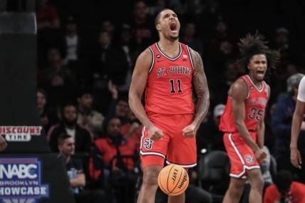 Dec 10, 2023; Brooklyn, New York, USA; St. John's Red Storm center Joel Soriano (11) celebrates after scoring in the second half against the Boston College Eagles at Barclays Center. Mandatory Credit: Wendell Cruz-USA TODAY Sports