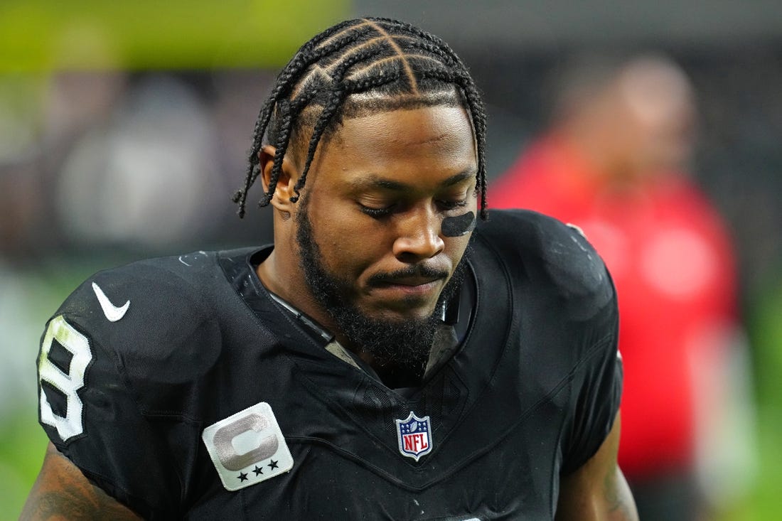 Dec 10, 2023; Paradise, Nevada, USA; Las Vegas Raiders running back Josh Jacobs (8) walks off the field after the Raiders were defeated by the Minnesota Vikings 3-0 at Allegiant Stadium. Mandatory Credit: Stephen R. Sylvanie-USA TODAY Sports