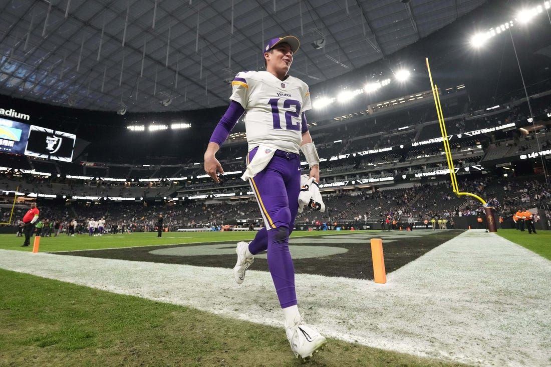 Dec 10, 2023; Paradise, Nevada, USA; Minnesota Vikings quarterback Nick Mullens (12) celebrates after the game against the Las Vegas Raiders at Allegiant Stadium. Mandatory Credit: Kirby Lee-USA TODAY Sports