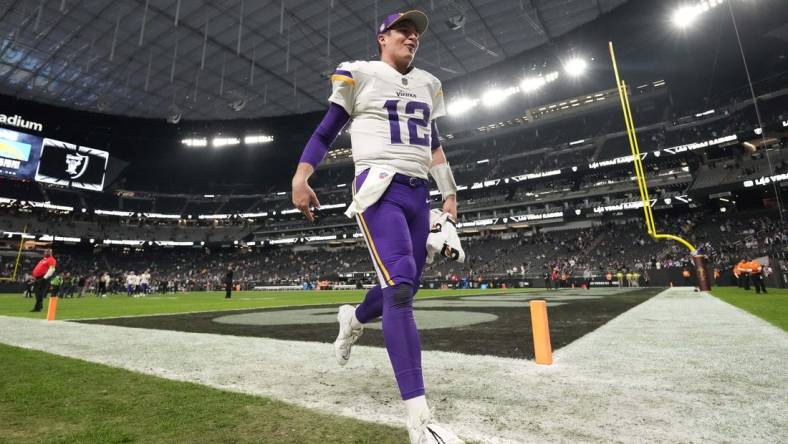 Dec 10, 2023; Paradise, Nevada, USA; Minnesota Vikings quarterback Nick Mullens (12) celebrates after the game against the Las Vegas Raiders at Allegiant Stadium. Mandatory Credit: Kirby Lee-USA TODAY Sports